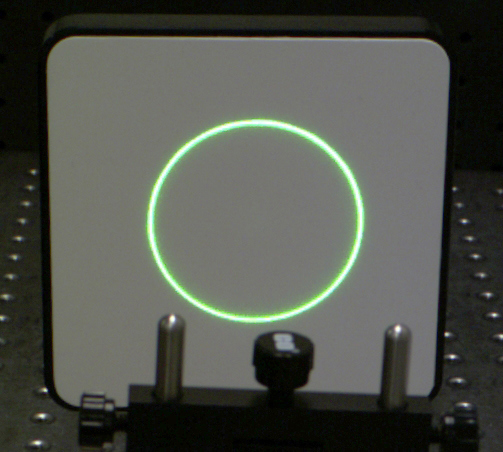 Skizze: Grünes Laserlicht eines Axicons bei L = 228,6 mm.